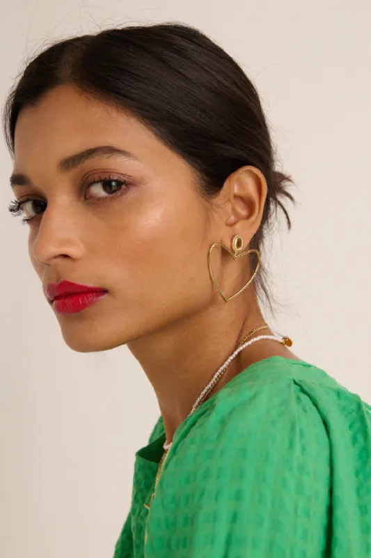 Golden Liaison earrings sold by Balzac Paris