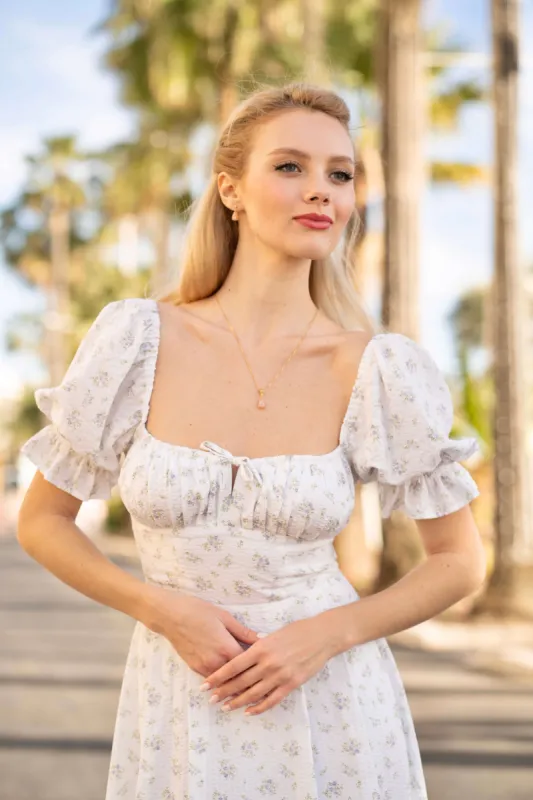 Mira Puffed Sleeve Dress sold by GAALA