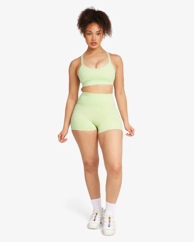 Activluxe Contour Pocket Shorts 4" | Limelight sold by Crop Shop Boutique