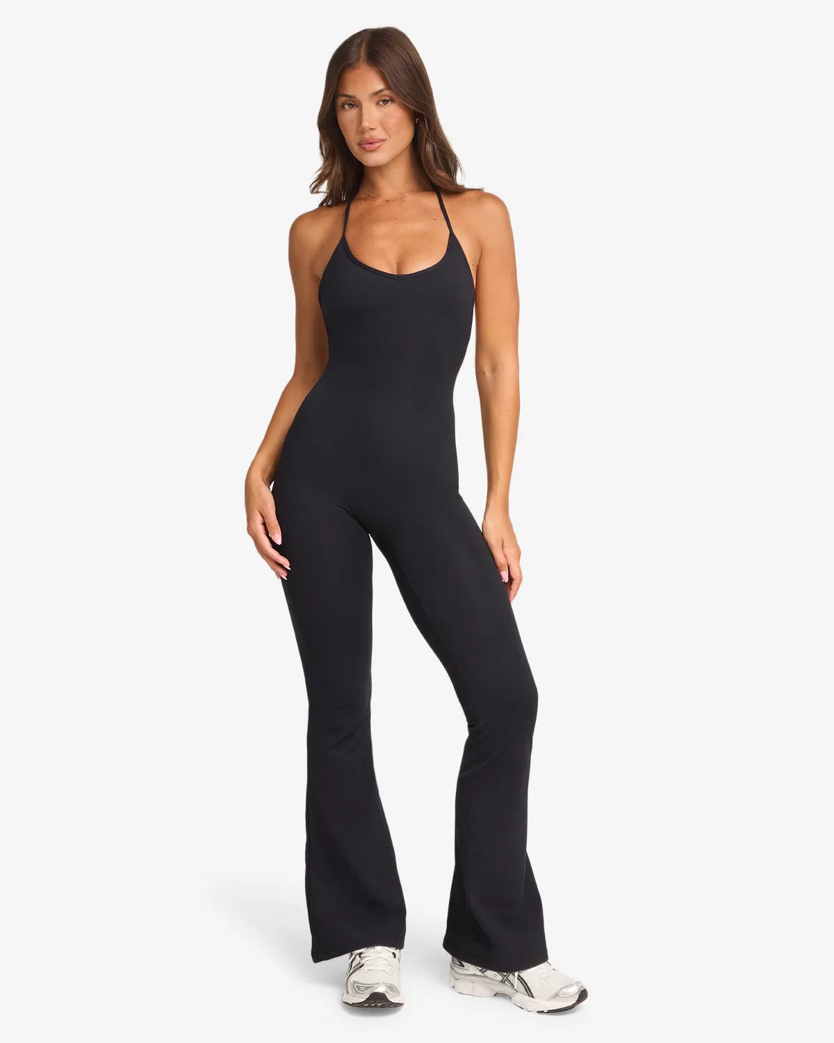 Form Flare Jumpsuit | Black sold by Crop Shop Boutique