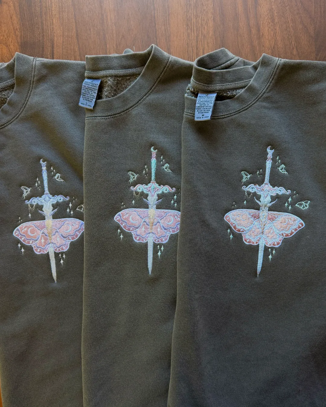Sample Sale - To Tell a Story crewnecks sold by Enchanted Oddities