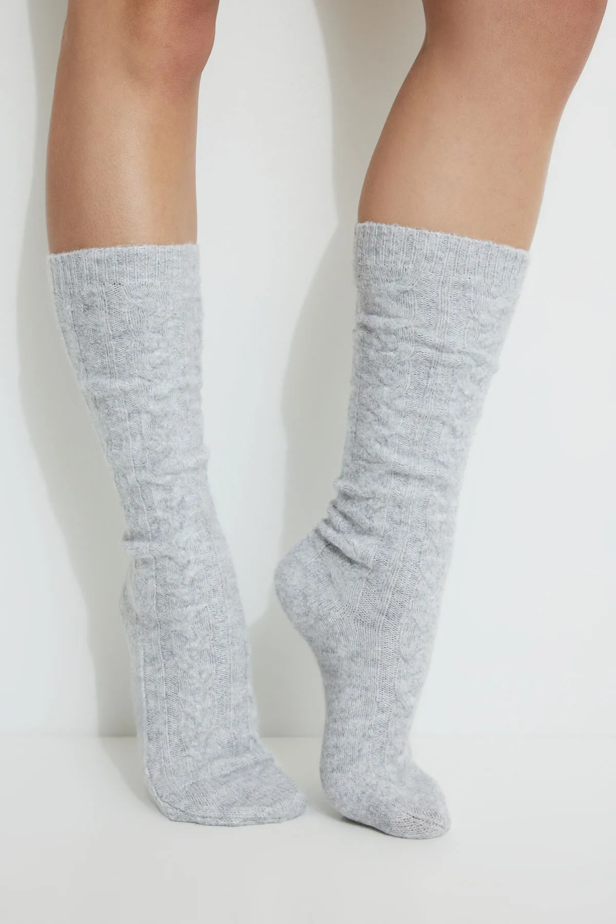 Heavenlyarn™ Cable Knit Calf High Socks sold by Dynamite