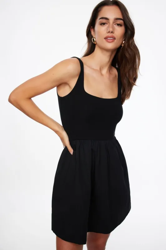 Mixed Media Flare Mini Dress sold by Dynamite