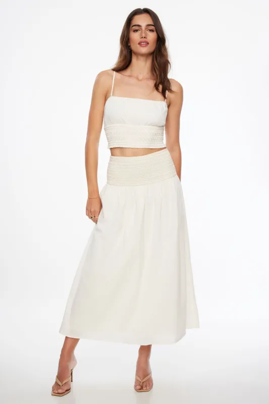 Drop Waist Smocked Maxi Skirt sold by Dynamite