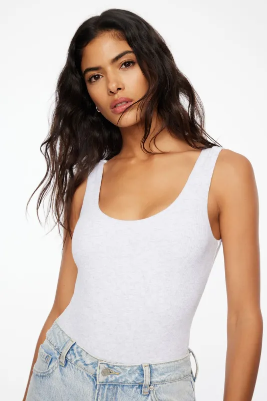 Nessa Sleeveless Ribbed Bodysuit sold by Dynamite