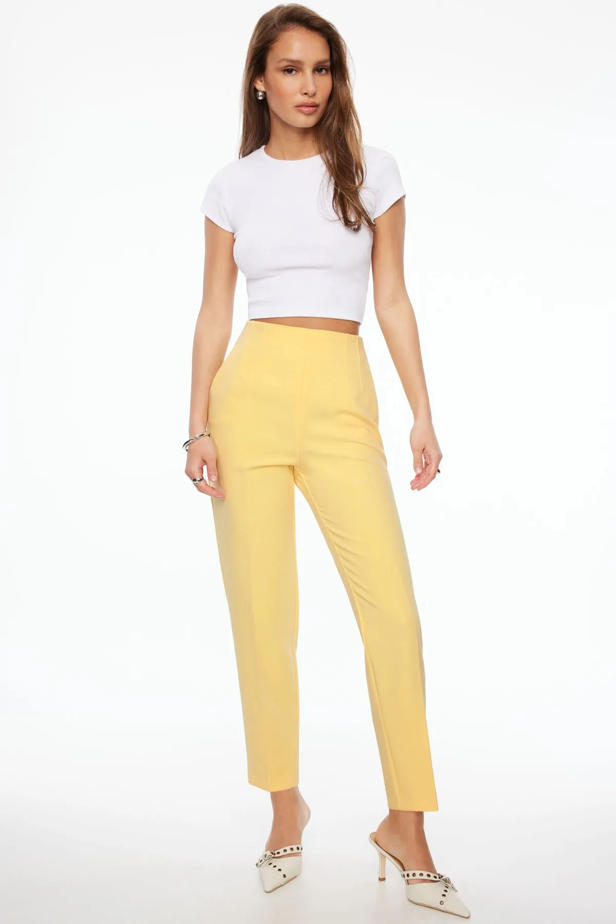 Kendall Slim Side Zip Pants sold by Dynamite