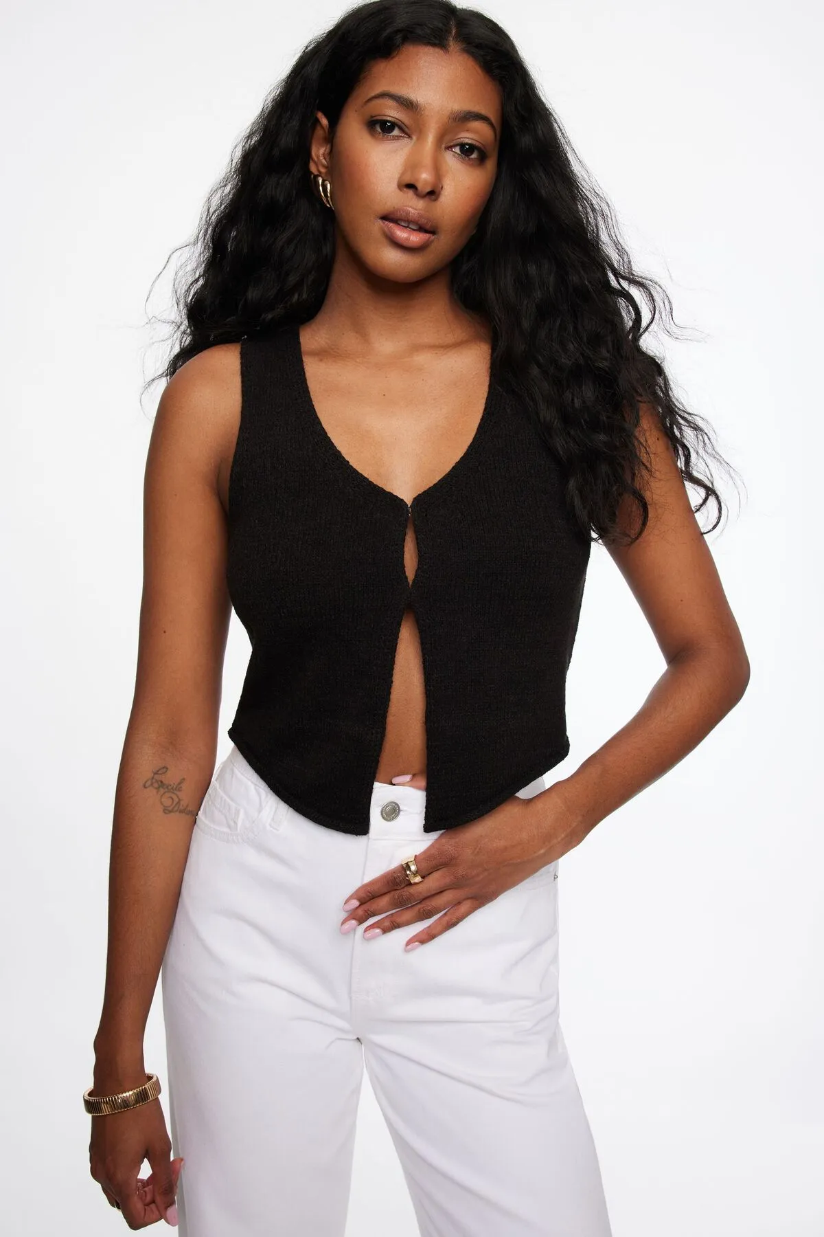 Keyhole Knit Vest sold by Dynamite