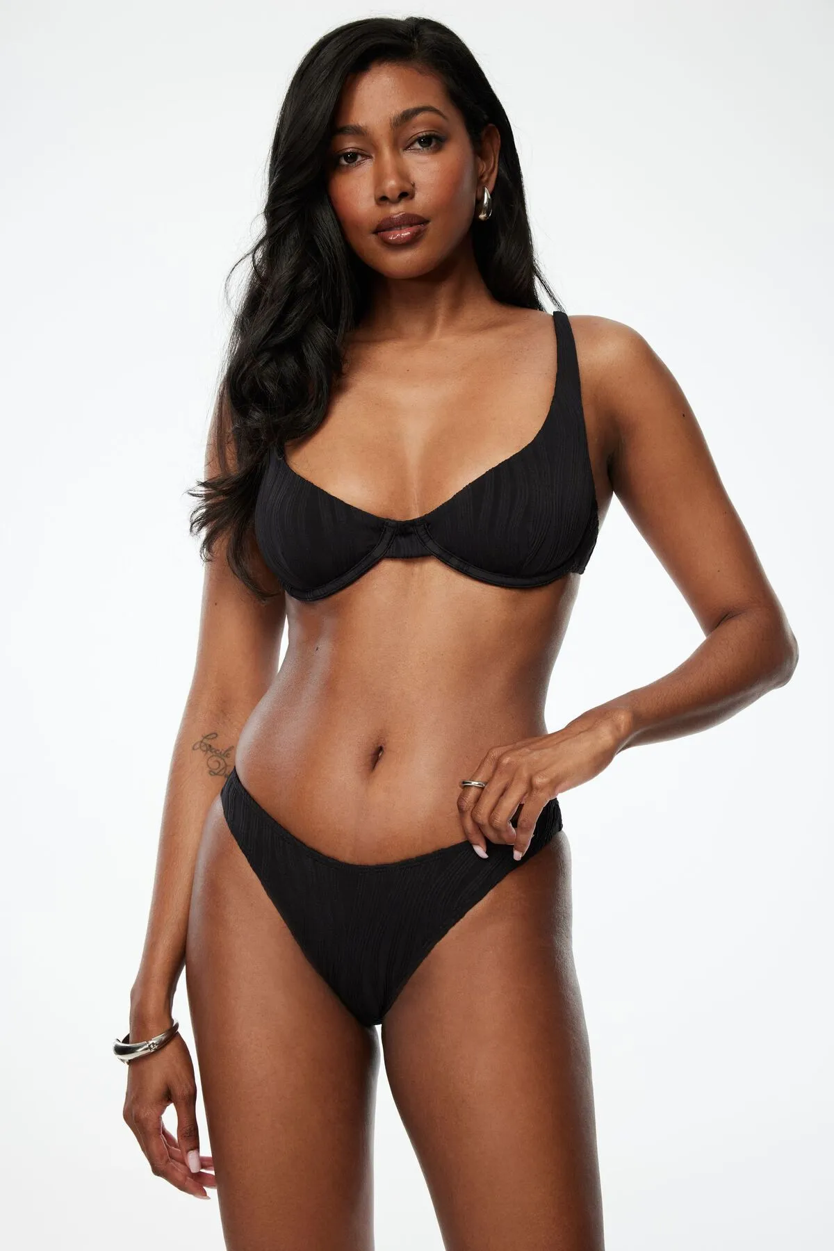 Textured Boomerang Cheeky Bikini Bottoms sold by Dynamite