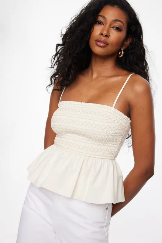 Smocked Peplum Cami sold by Dynamite