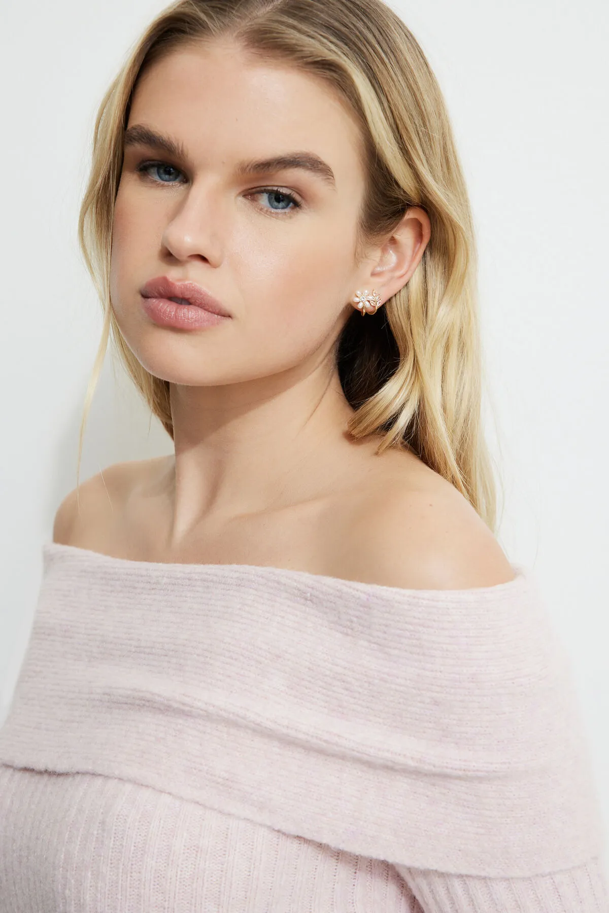 Pearl Flower & Leaf Huggie Earrings sold by Dynamite