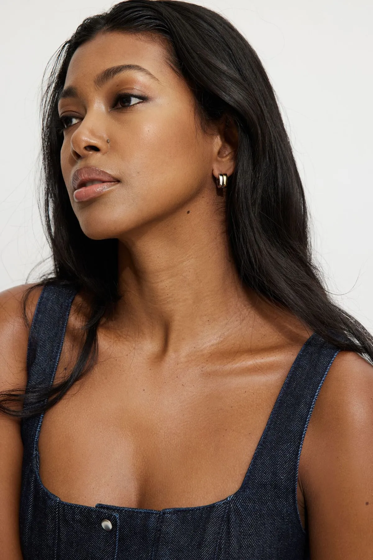 2-Tone Huggie Earrings sold by Dynamite