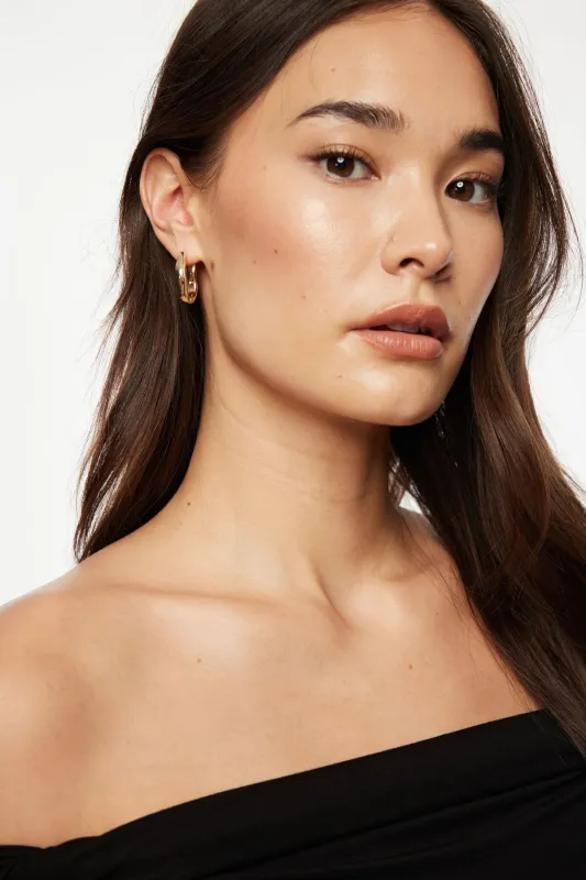 Wave Hoop Earrings sold by Dynamite