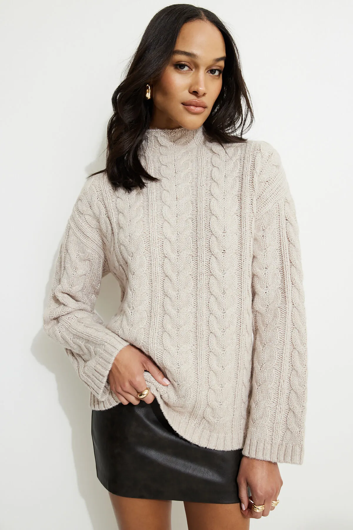 Cable Knit Mock Neck Sweater sold by Dynamite
