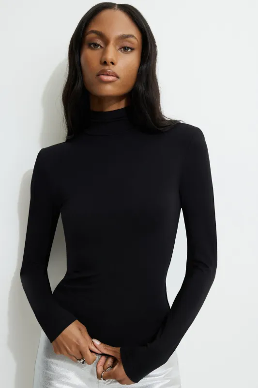 Shoulder Pad Mock Neck T Shirt sold by Dynamite