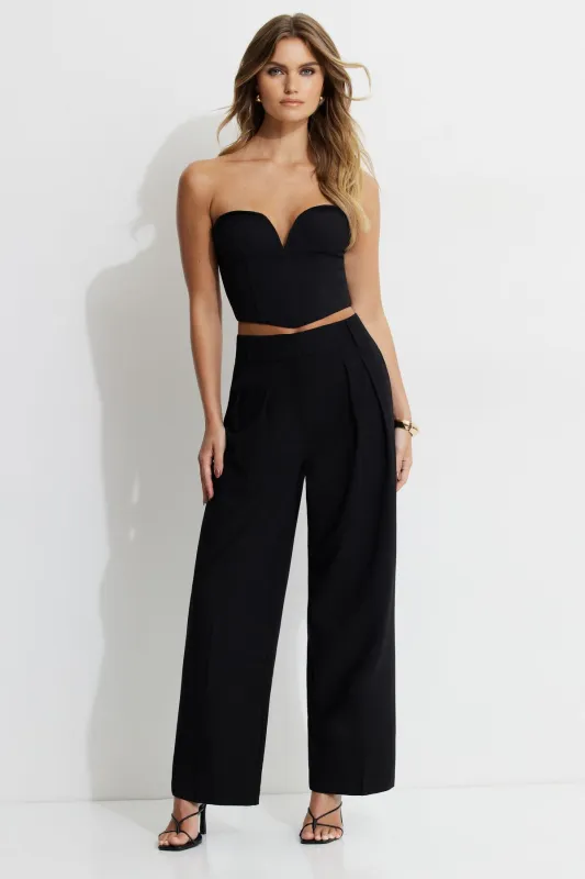 Drop Waist Pleated Pants sold by Dynamite