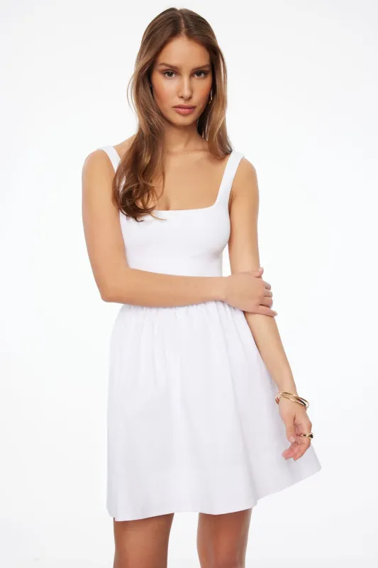 Mixed Media Flare Mini Dress sold by Dynamite