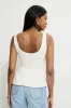 Low Back Peplum Top sold by Dynamite