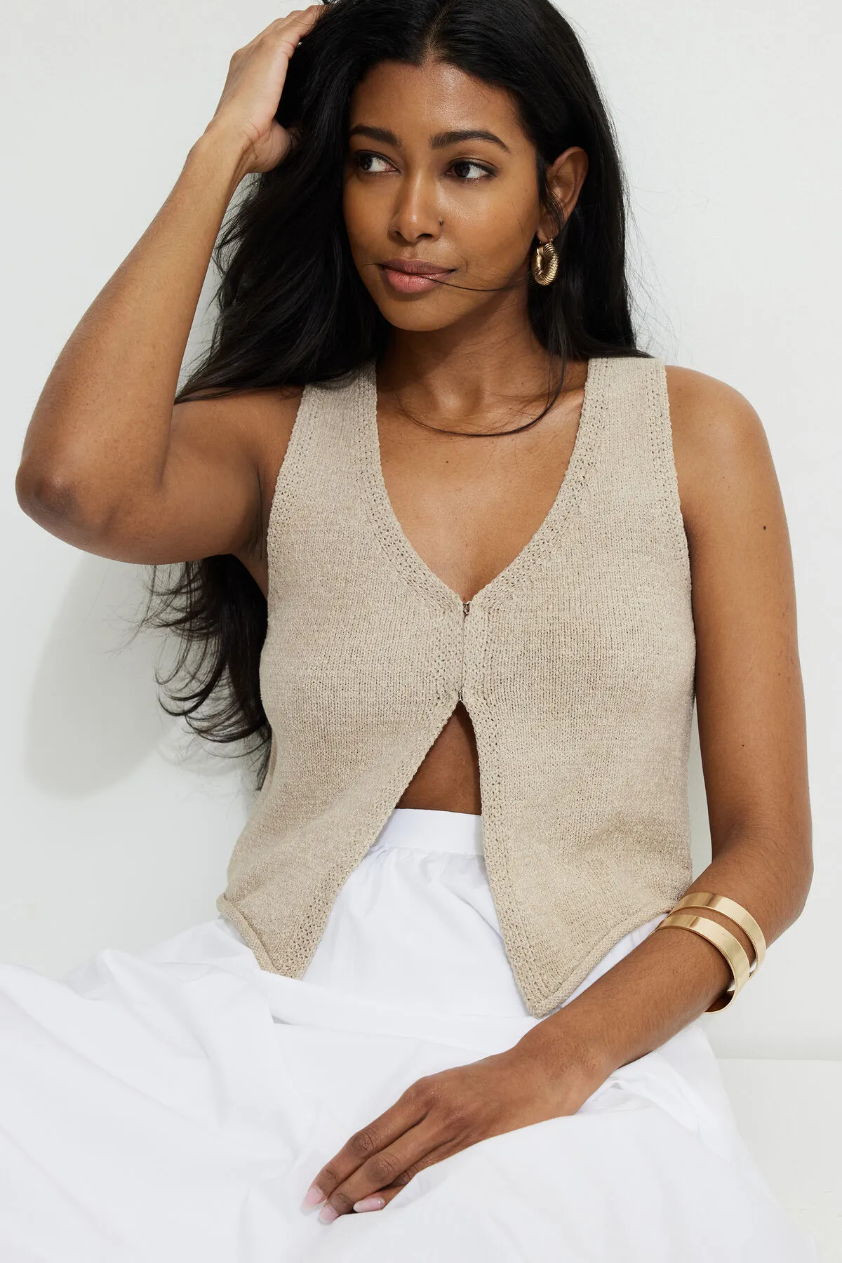 Keyhole Knit Vest sold by Dynamite