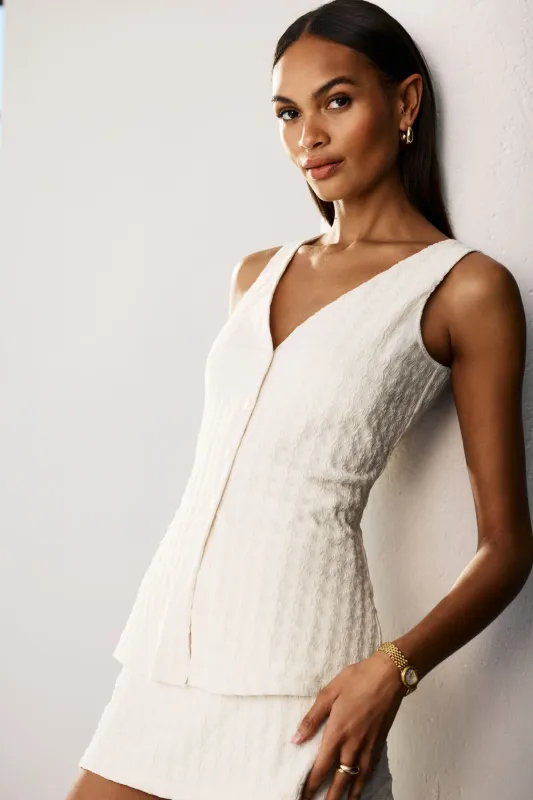 Textured V Neck Flyaway Vest sold by Dynamite