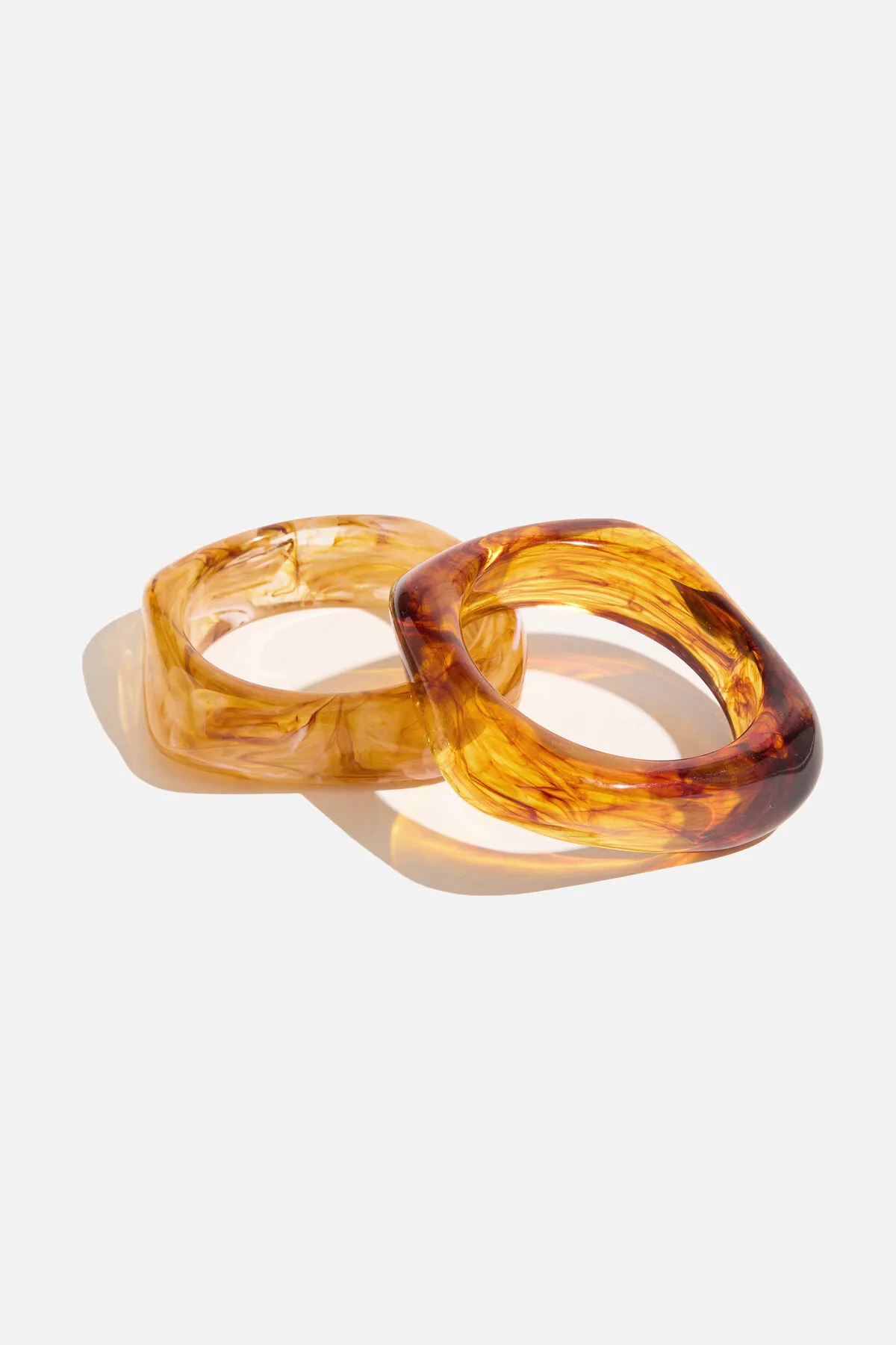 2-Pack Resin Bangle Bracelets sold by Dynamite