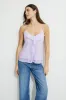 Clover Ruffled Cami Top sold by Dynamite
