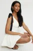 Eloise Bow Strap Mini Dress sold by Dynamite