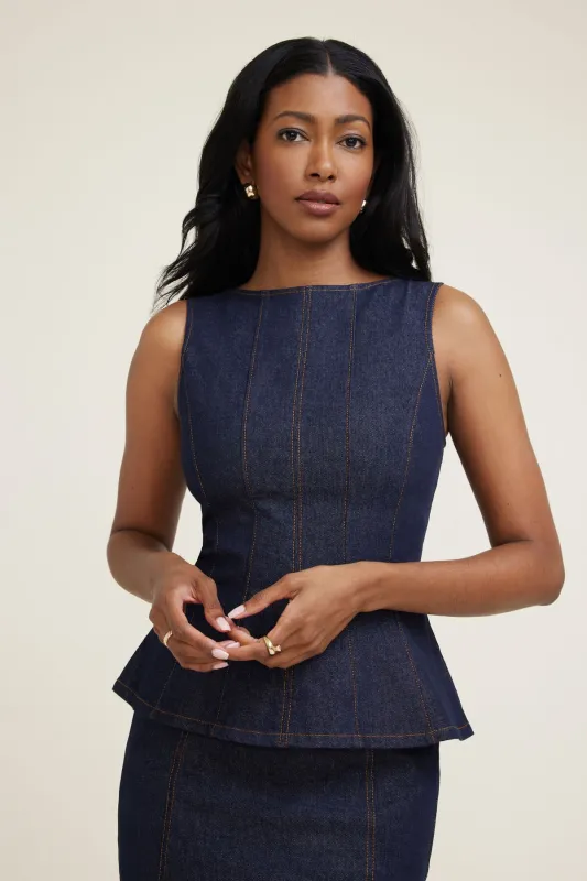 Peplum Denim Top sold by Dynamite