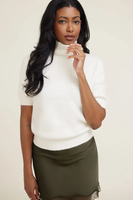 Lora Short Sleeve Turtleneck Sweater sold by Dynamite