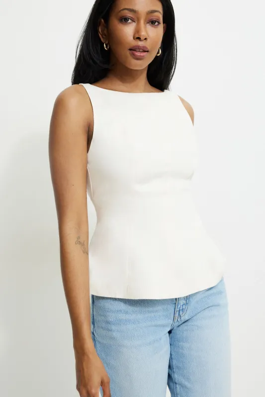 Low Back Peplum Top sold by Dynamite