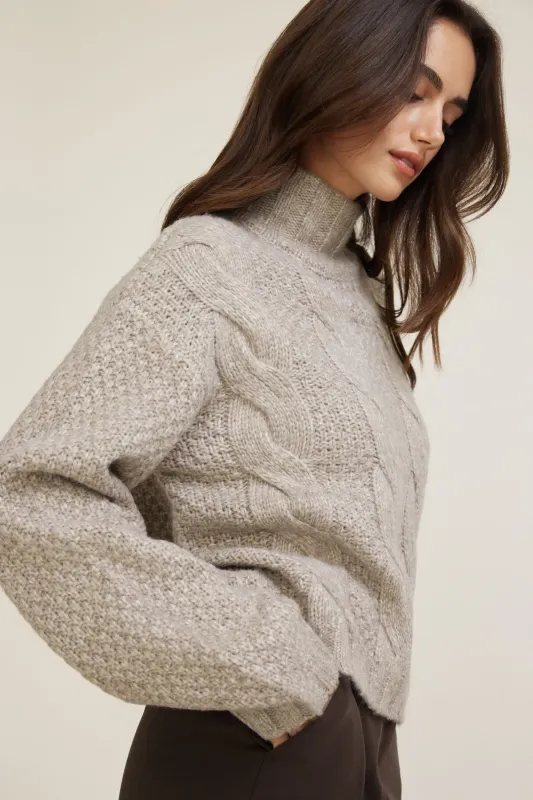 Sasha Cable Knit Funnel Neck Sweater sold by Dynamite