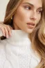 Sasha Cable Knit Funnel Neck Sweater sold by Dynamite