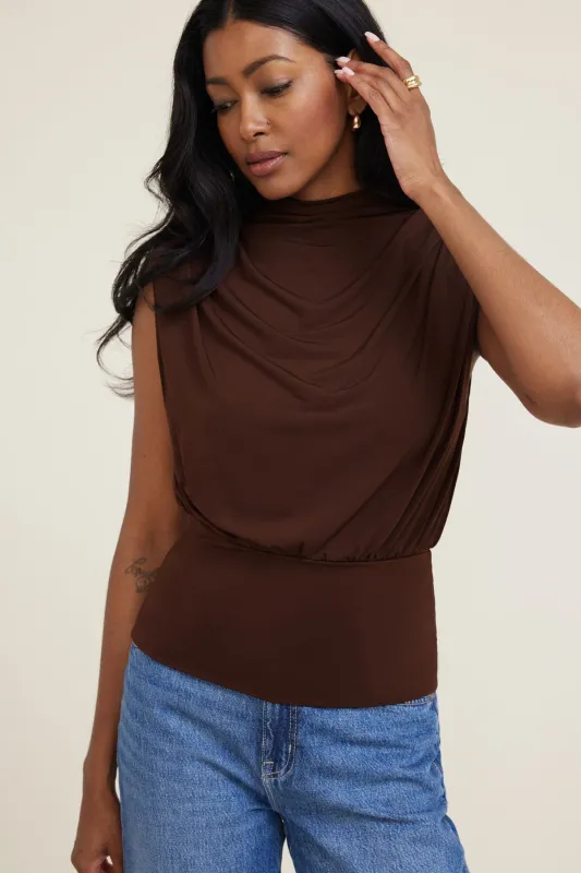 Mockneck Top With Shoulder Pads sold by Dynamite