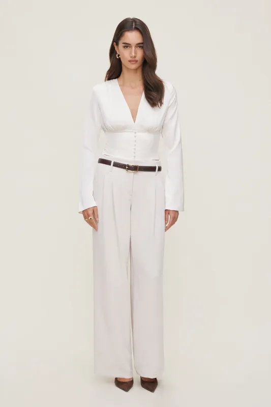 Draped V Neck Satin Blouse sold by Dynamite