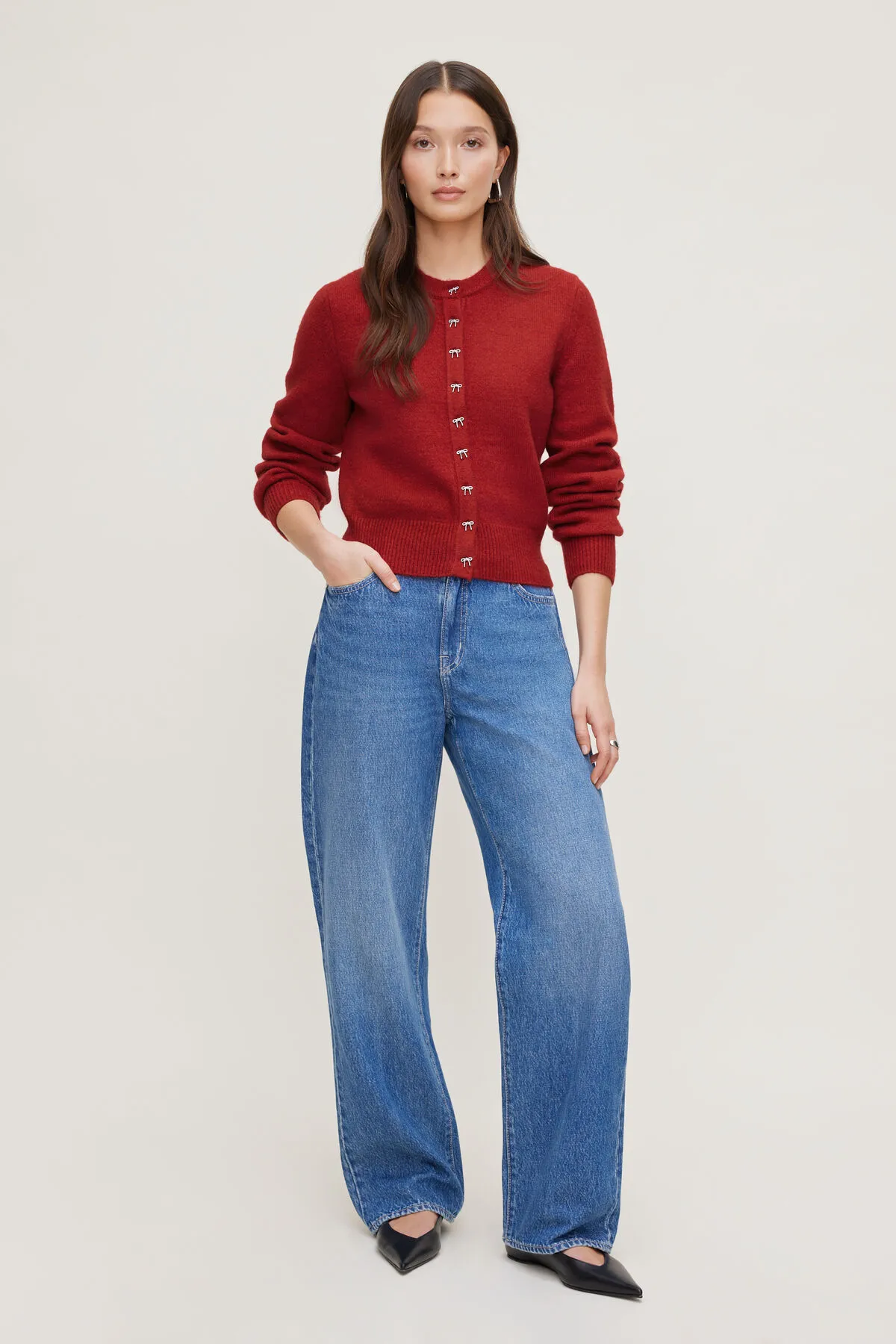 Rebecca Bow Button Cardigan sold by Dynamite