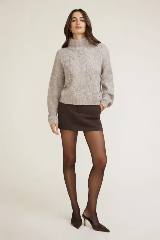 Sasha Cable Knit Funnel Neck Sweater sold by Dynamite