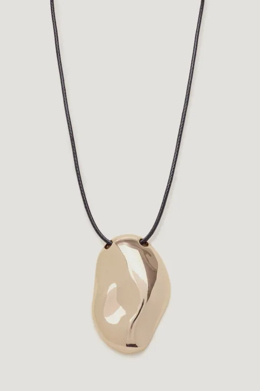 Rock Pendant Cord Necklace sold by Dynamite