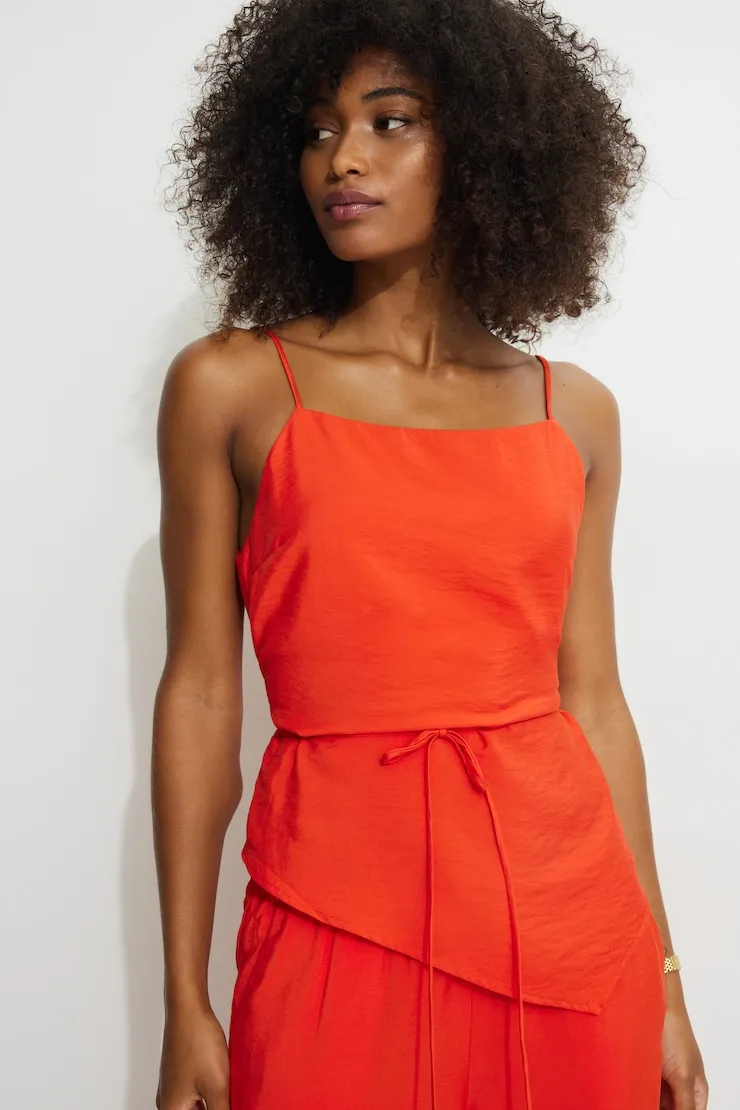 Asymmetric Back Tie Camisole sold by Dynamite