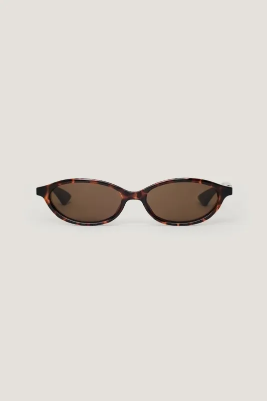 LE SPECS | Duskfall Oval Sunglasses - Dynamite - Brown - Women Clothing made by Dynamite