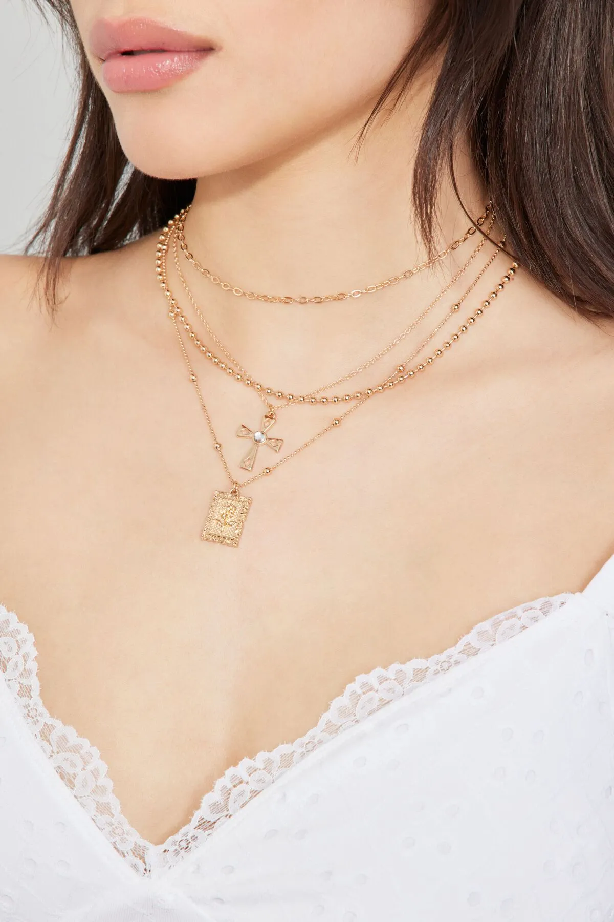 Set Of 4 Cross & Rose Pendant Necklaces sold by Garage