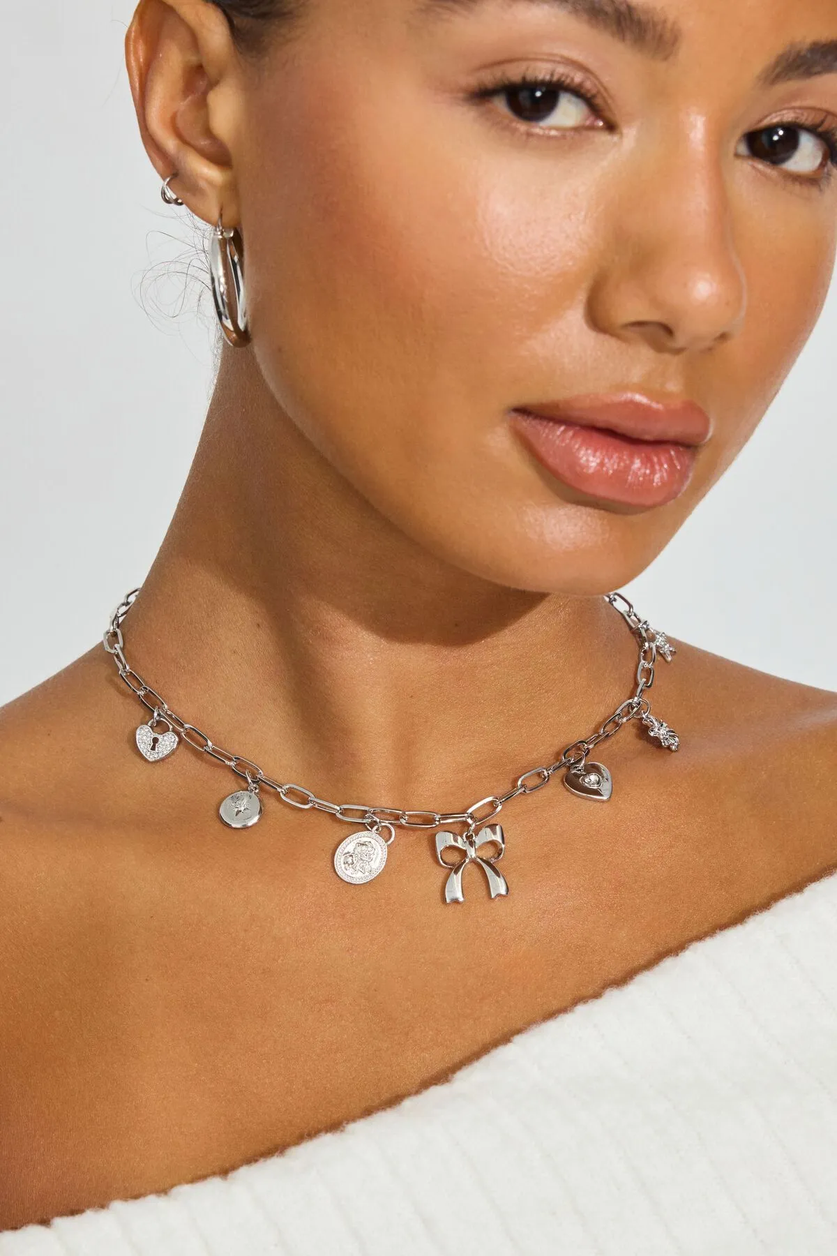 7 Charm Paperclip Necklace sold by Garage