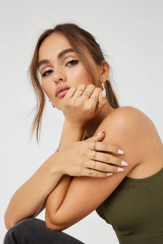 Set of 10 Gem, Rose & Star Rings sold by Garage