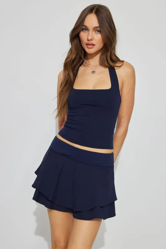 Flare Active Skort sold by Garage