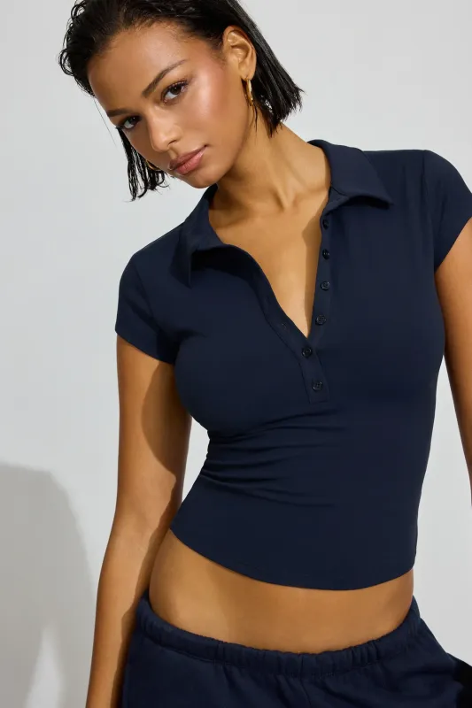 Sleek Short Sleeve Polo Top sold by Garage