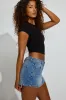 Denim Micro Skort sold by Garage