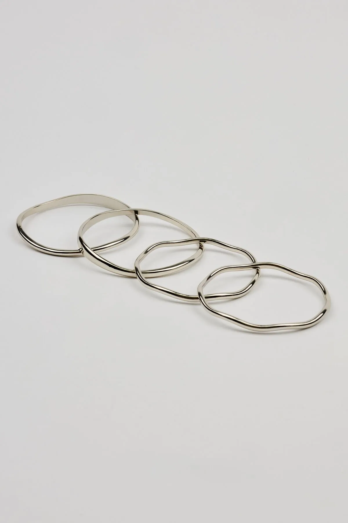 Set of 4 Wavy Bangles sold by Garage