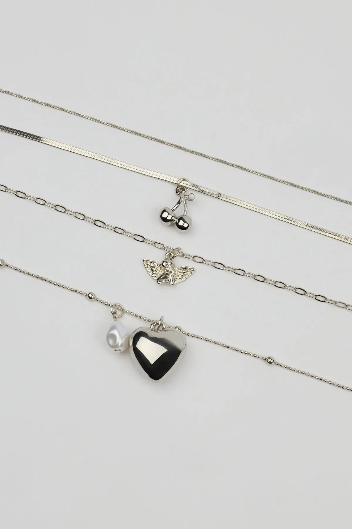 Set of 4 Angel and Cherry Pendant Necklaces - Garage - Grey - Women Clothing sold by Garage product image thumbnail 2