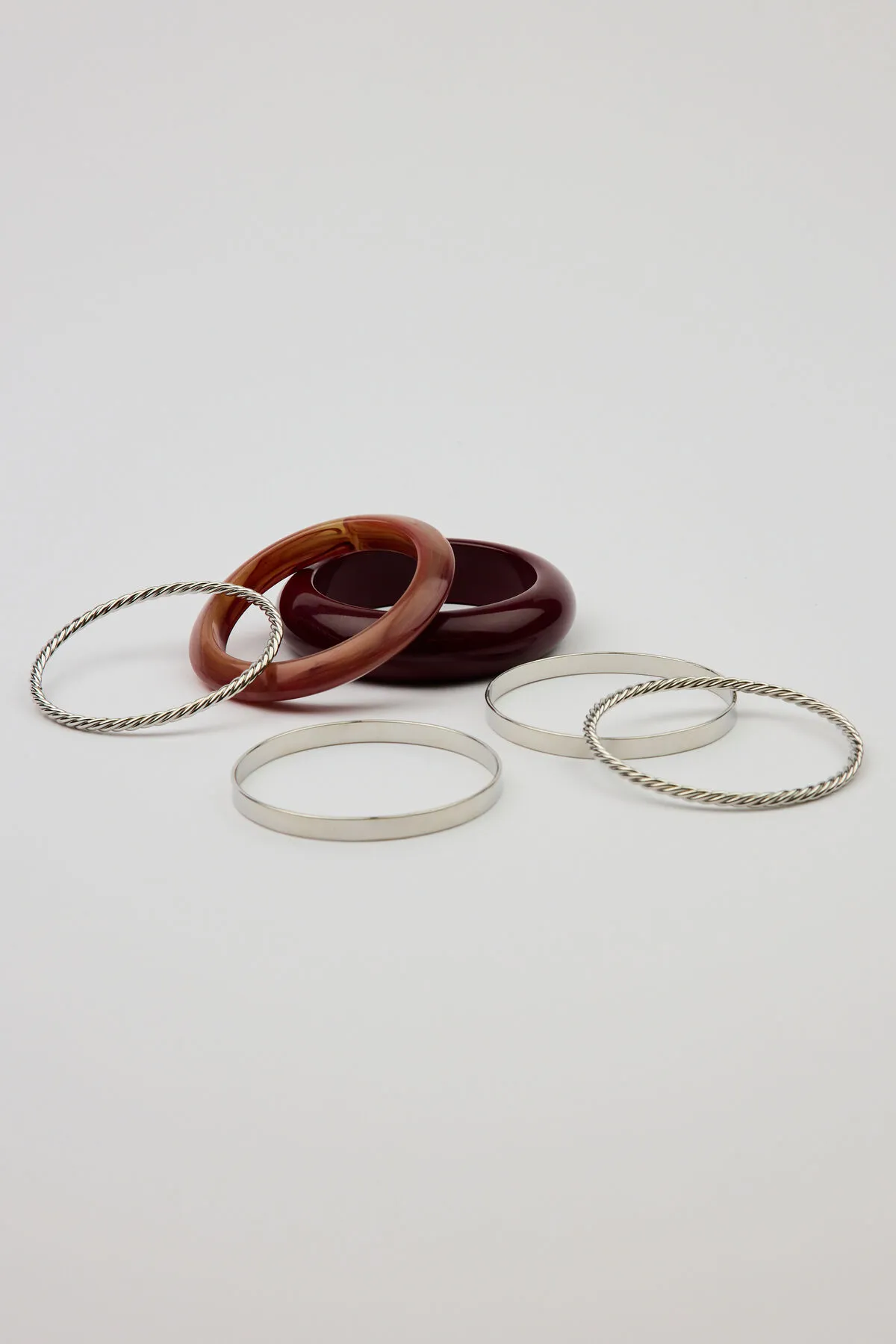 Set of 6 Resin & Clean Metal Bangles sold by Garage