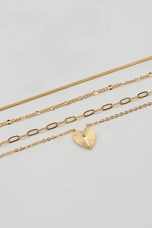 Set of 4 Heart & Chain Necklaces sold by Garage