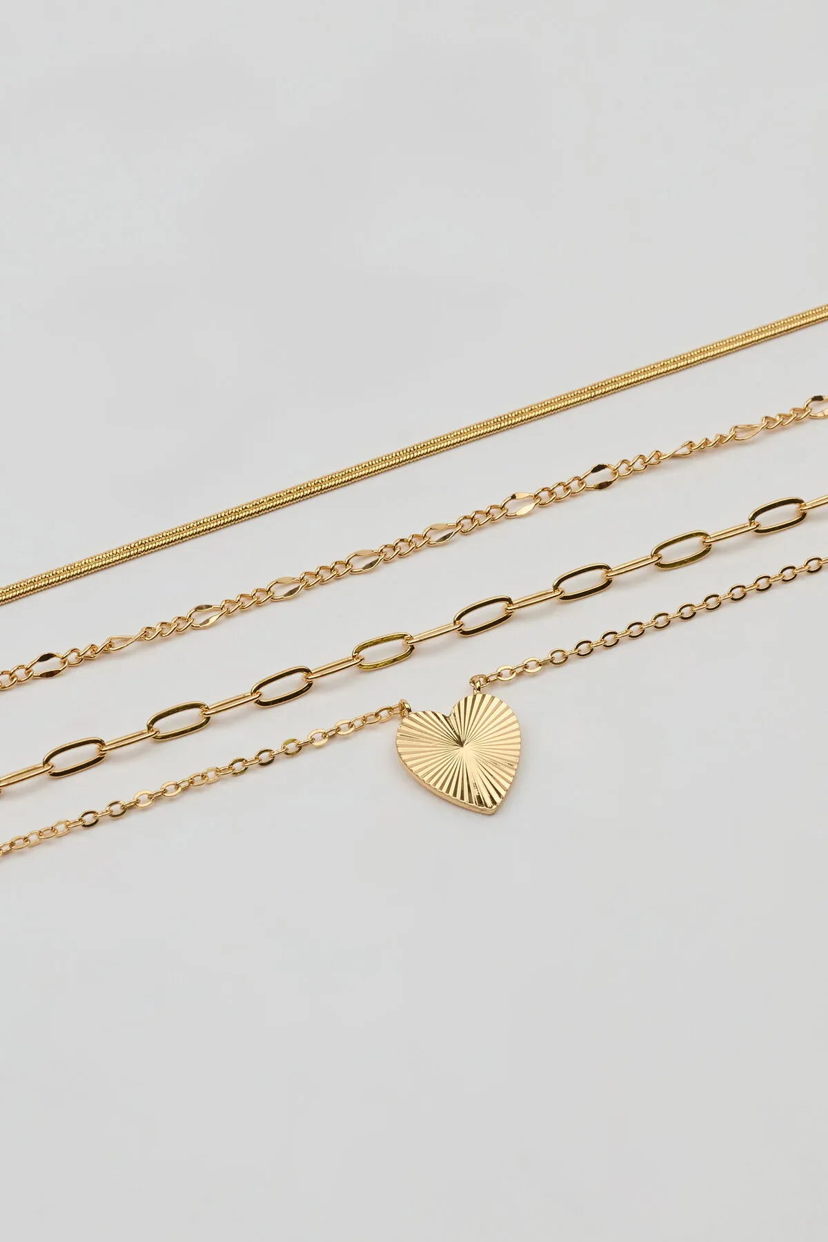 Set of 4 Heart & Chain Necklaces sold by Garage