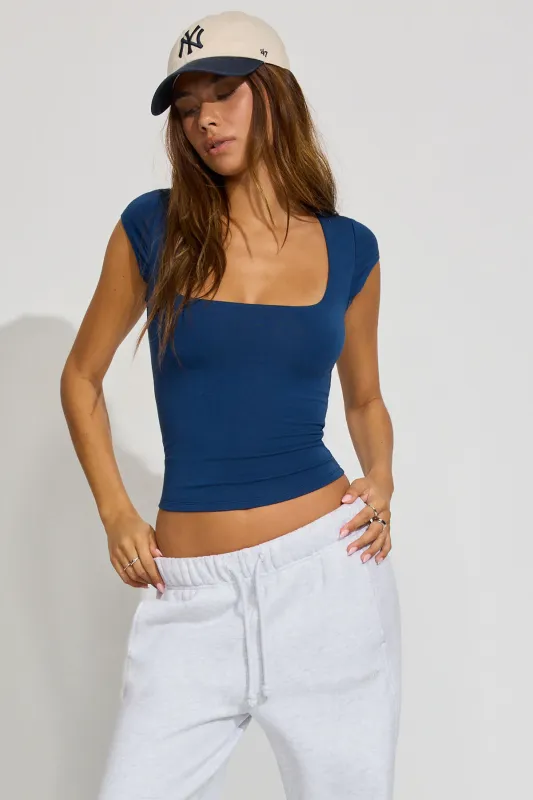 Smooth Open Neck Tee sold by Garage